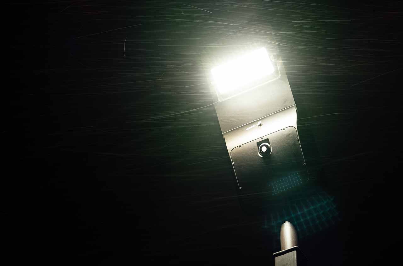 Solar street light installation in public park pathway