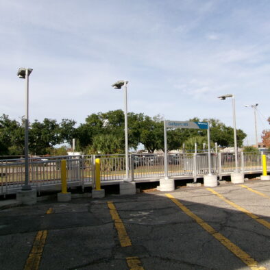 AMTRAK station solar light SUNLIKE dark sky version next to station walkway
